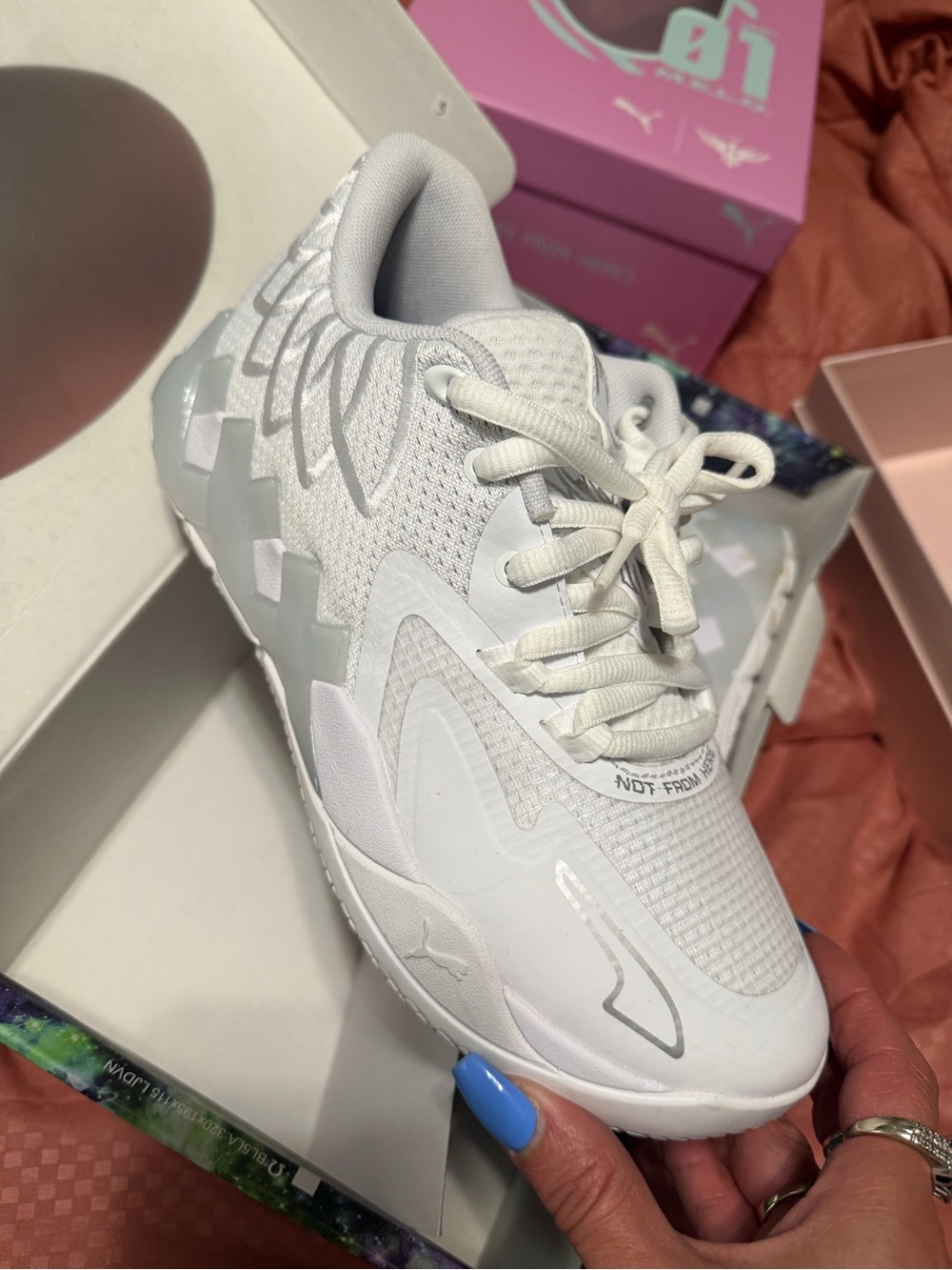 Puma Women’s White Athletic Sneakers with Subtle Silver Accents